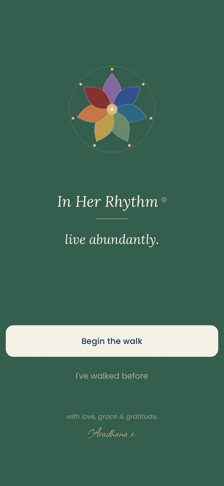 The opening screen: the seven petal lotus, live abundantly, and a button that says begin the walk